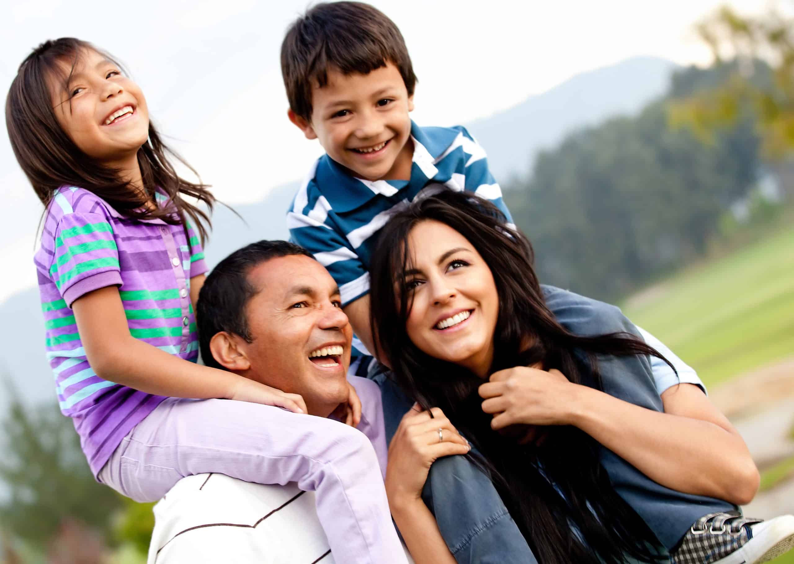 a man and woman with children